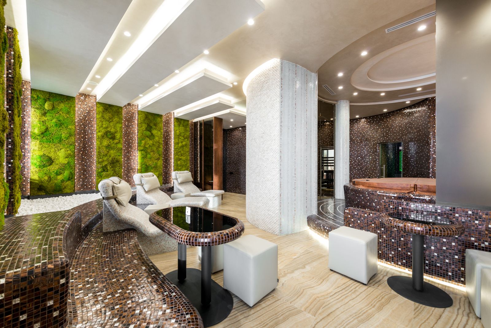 Warm spa interior with loungers and soft light